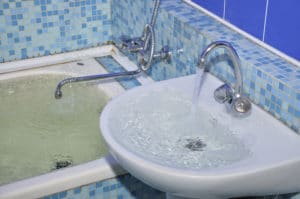 Regular plumbing maintenance to prevent water damage