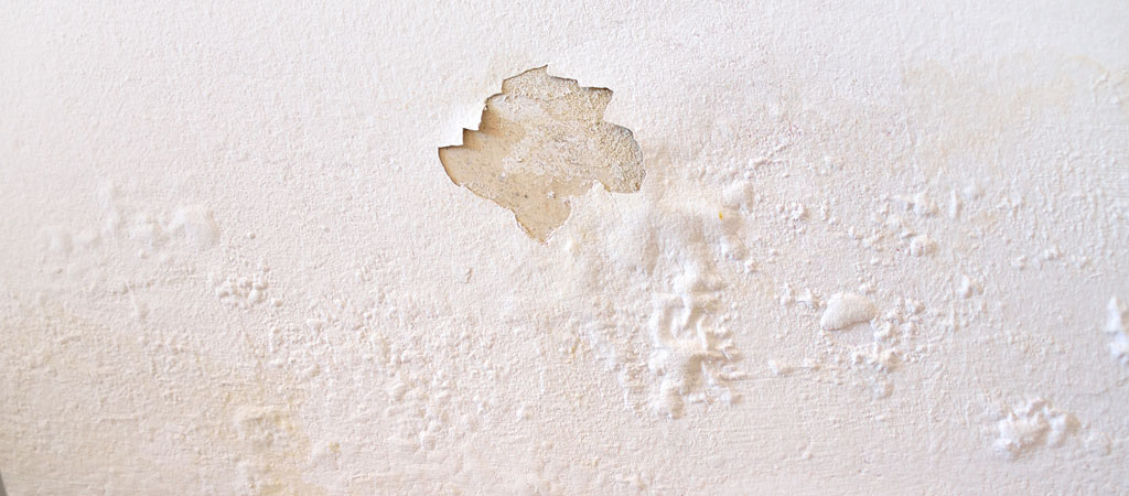 water leak causes peeling paint