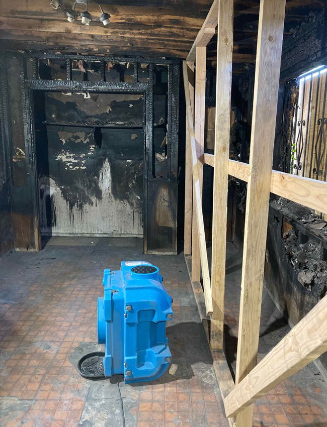 photo of a fire damaged room after fire cleanup
